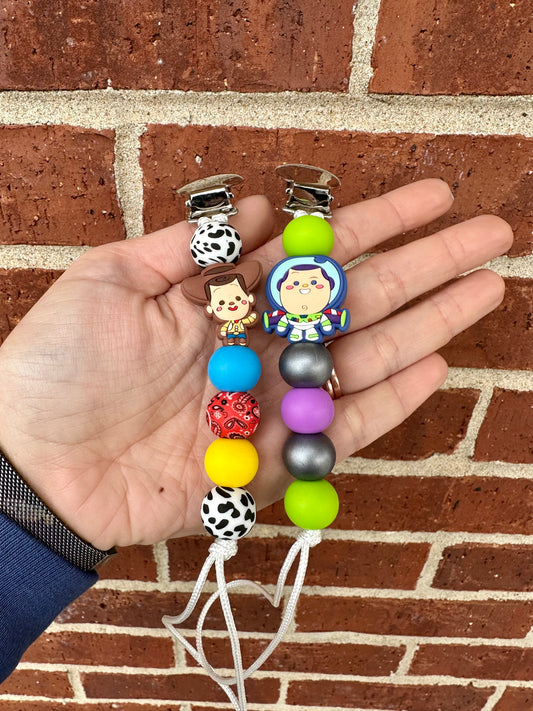 Cowboy + Spaceboy Pacifier Clip